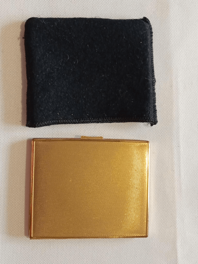 Poudrier noir et doré rectangulaire avec pochette